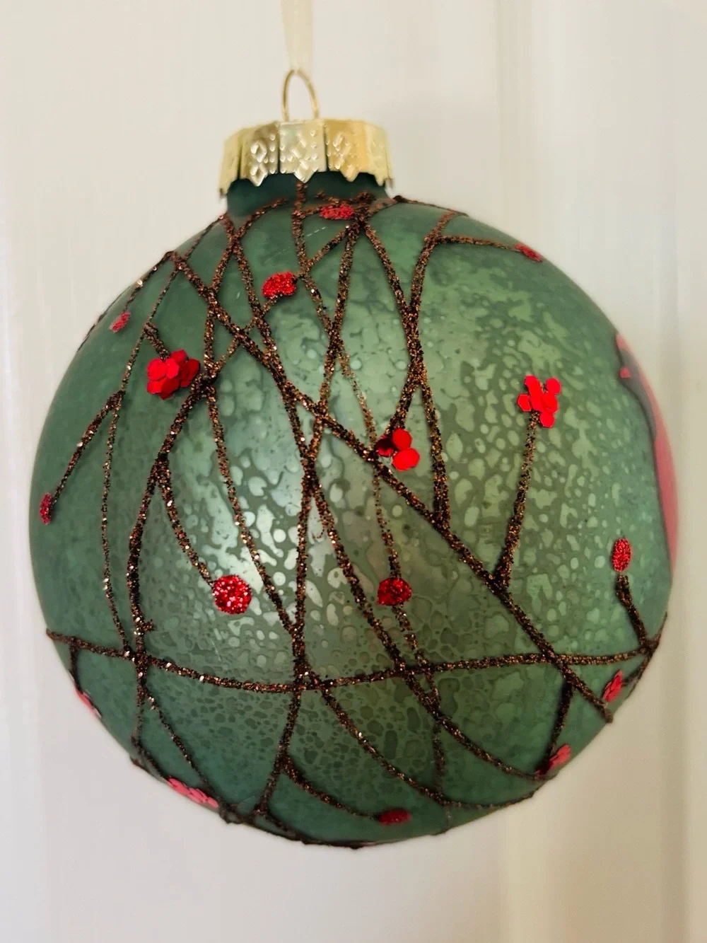 Hand-Painted Green Glass Ornament with Red Cardinal